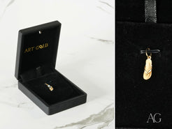 Golden Flip Flop Pendant in 18k gold showcased in a luxurious black jewelry box