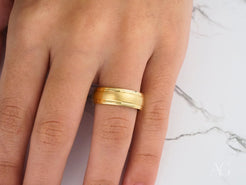 Gold Wedding Band in 14k Gold from Golden Fortress, worn elegantly on a finger