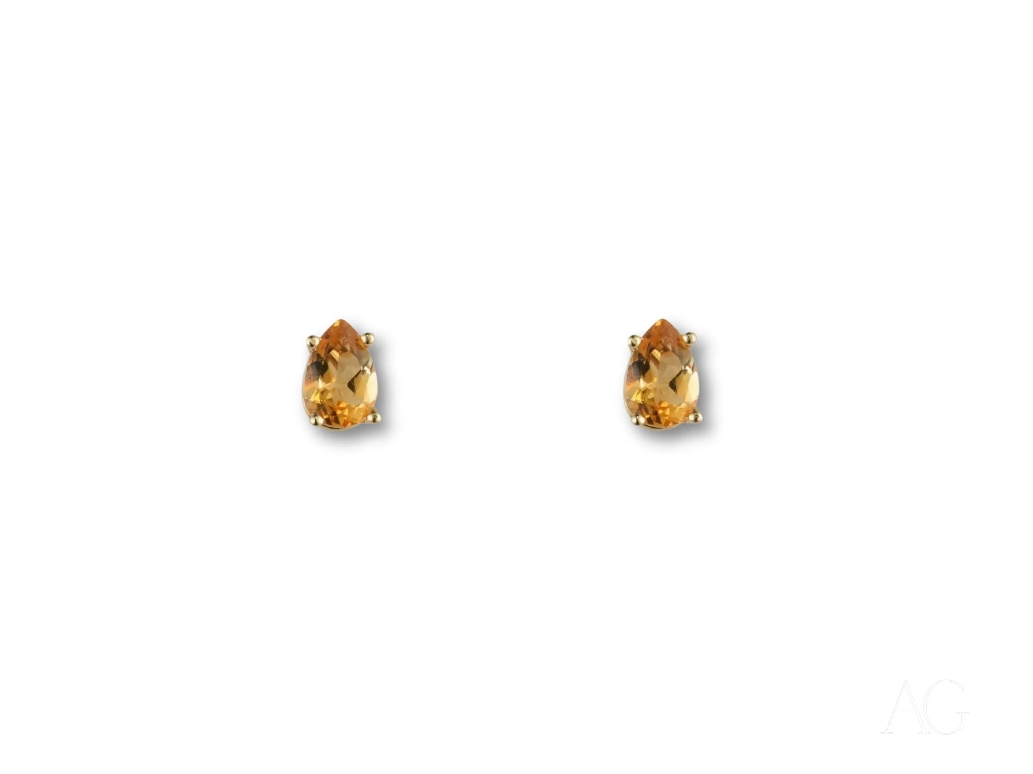 Elegant Golden Glow Citrine Studs featuring pear-cut citrine gemstones in 18k gold