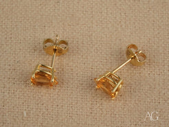 Pair of 18k Gold Citrine Earrings featuring pear-cut citrine gemstones in a stylish design