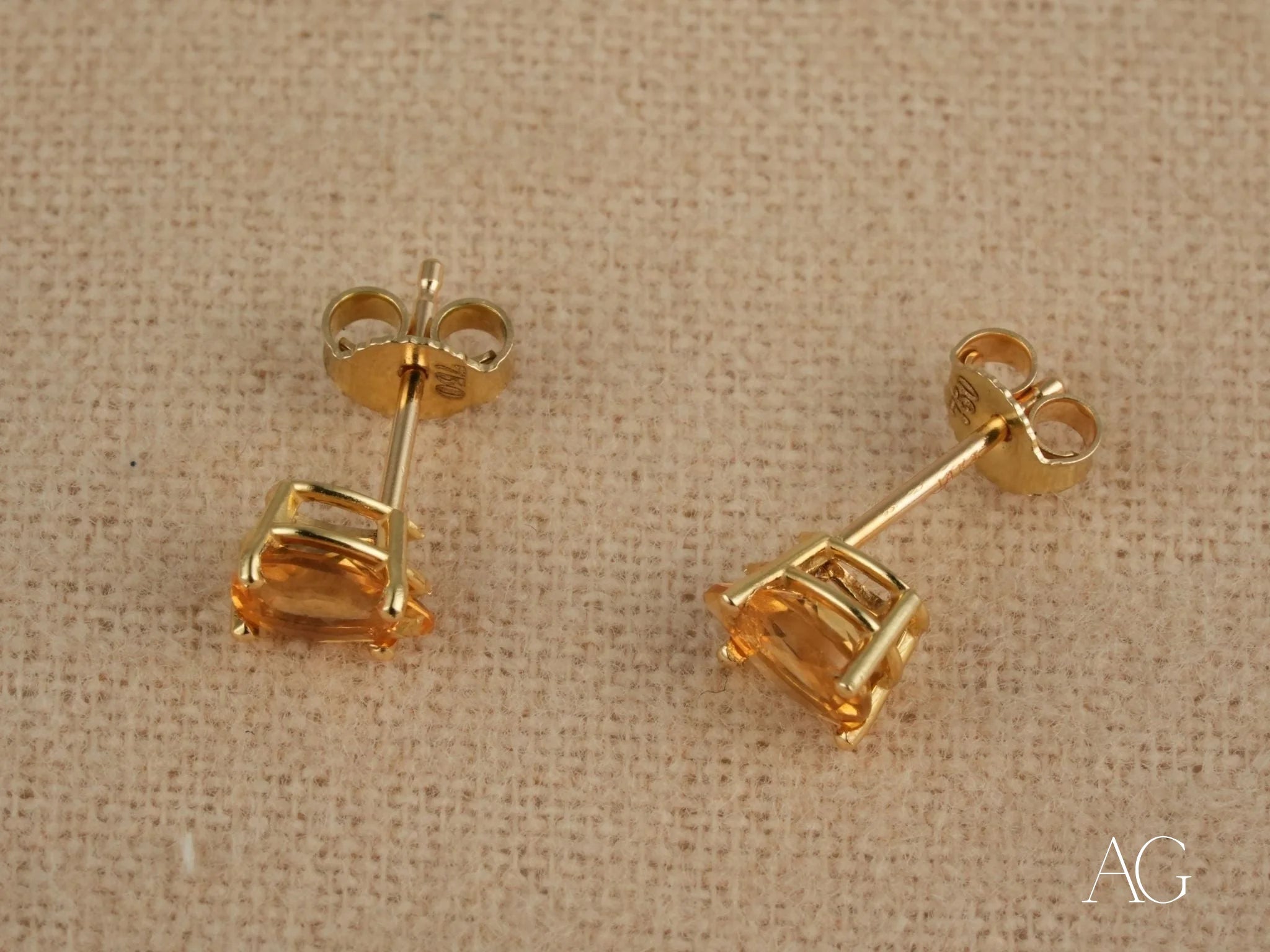 Pair of 18k Gold Citrine Earrings featuring pear-cut citrine gemstones in a stylish design