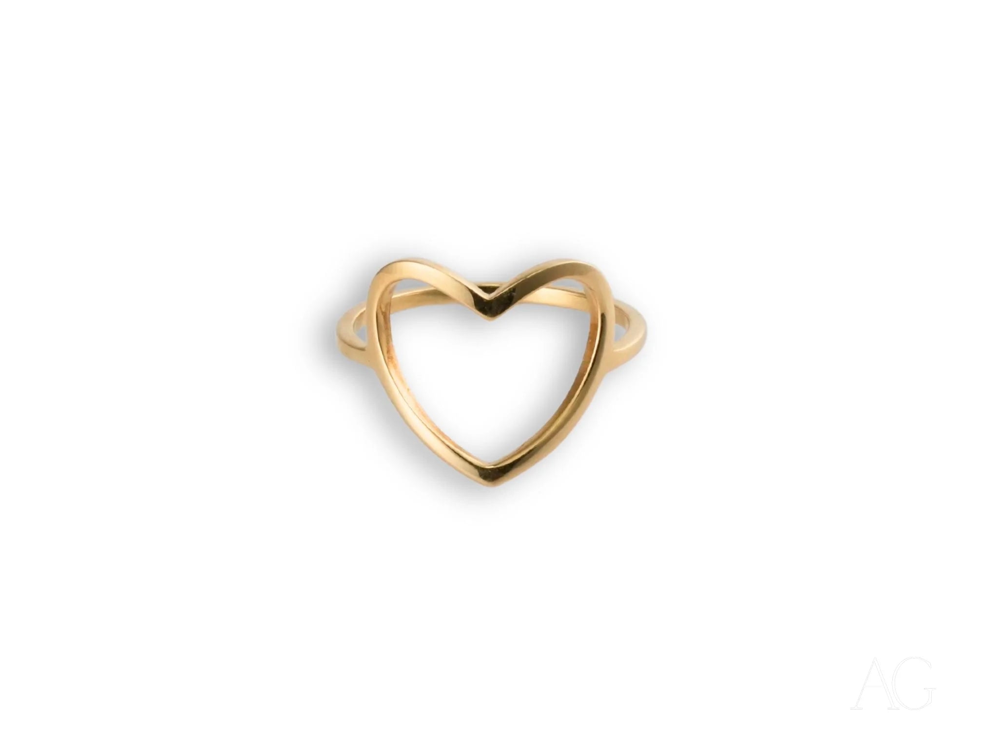 Gold heart-shaped ring with open-heart design in 18k gold for elegant style