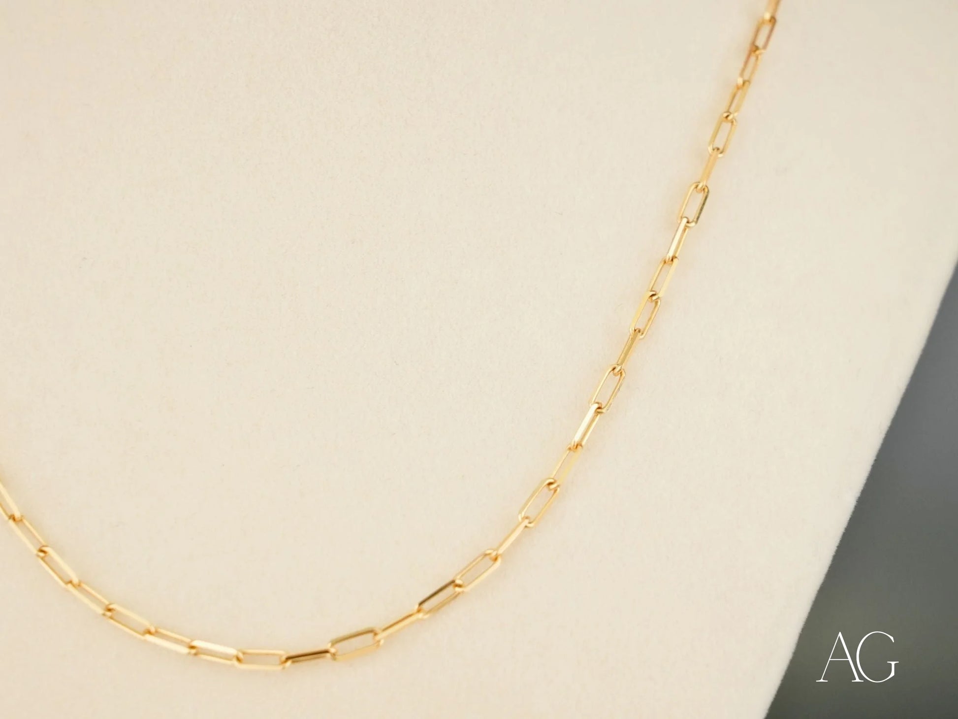 Gold rectangular link chain from the Golden Icon 18K Yellow Gold Paperclip Link Chain