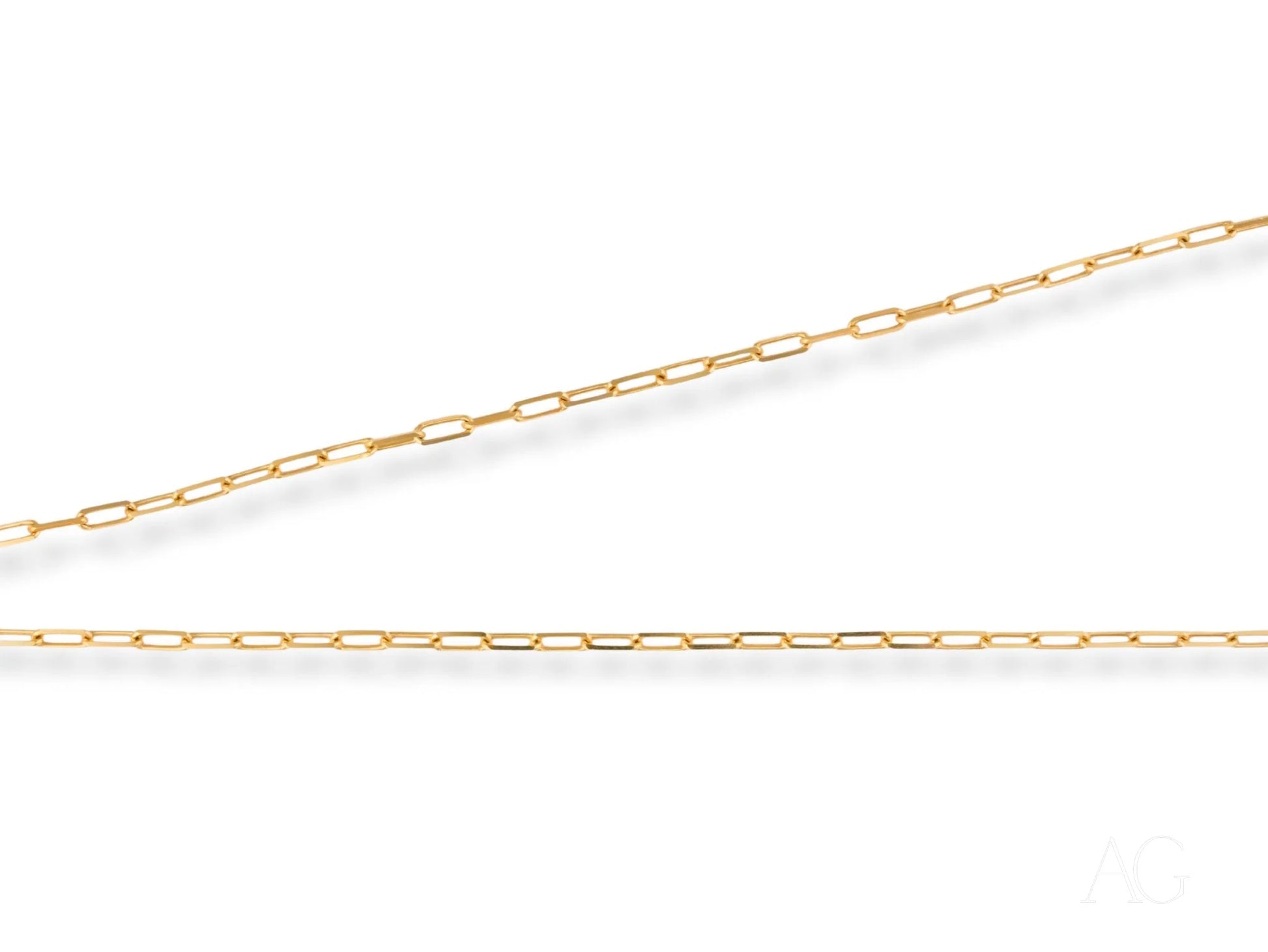 Two gold chain strands of the 18K Yellow Gold Paperclip Link Chain for art gold jewelry