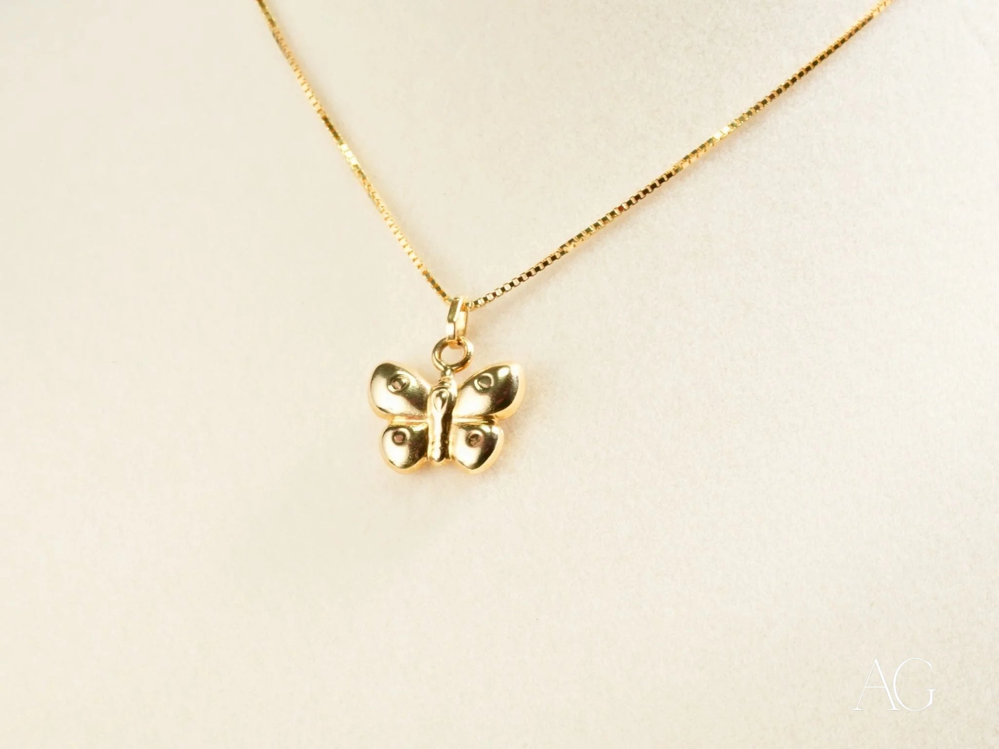 18k gold butterfly pendant necklace on a delicate chain from Golden Wings collection