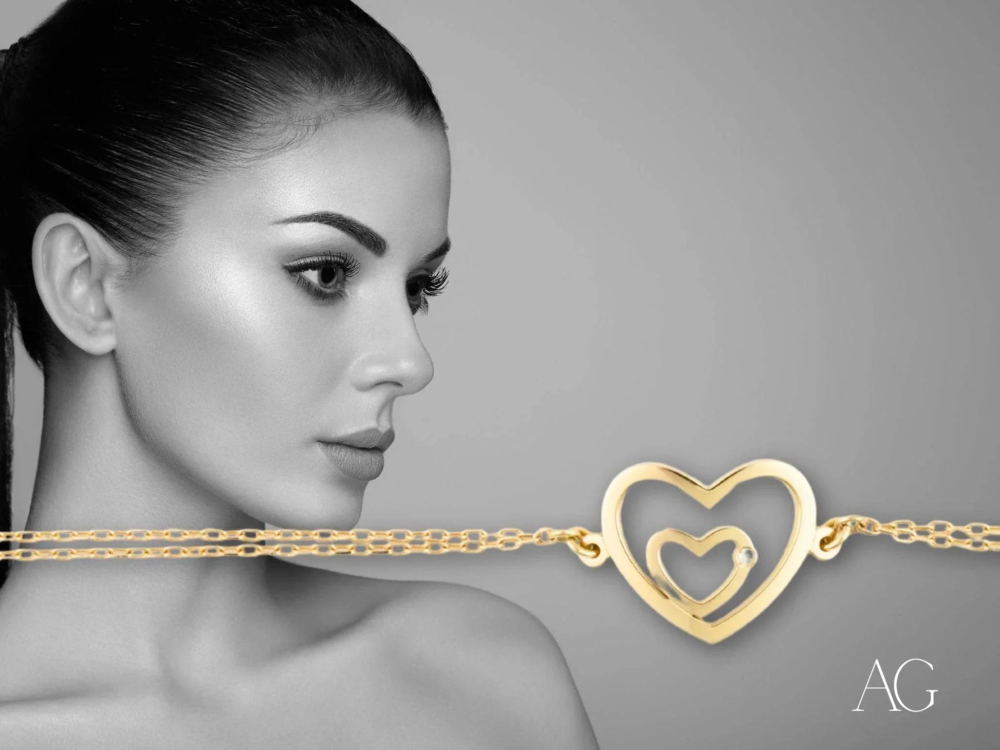 Yellow gold heart-shaped pendant on a chain necklace from the HHHH Collection