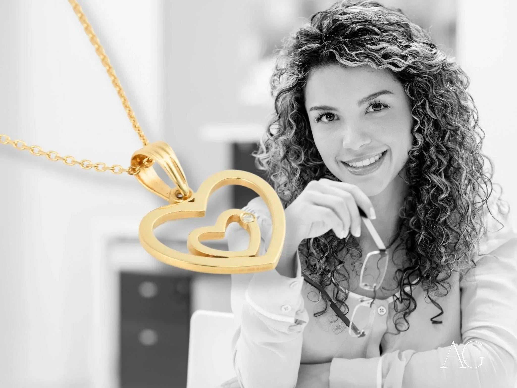 Heart pendant in 14k yellow gold with interlocking heart design from HHHH Collection