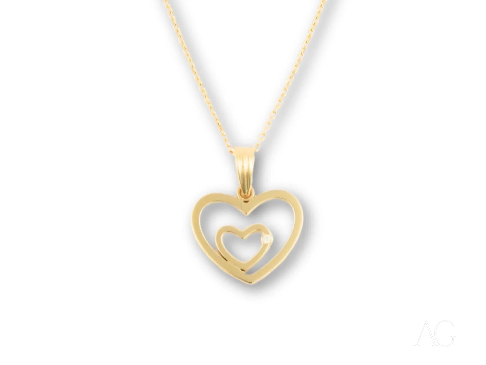 Gold heart pendant necklace with smaller heart in 14k yellow gold from HHHH Collection