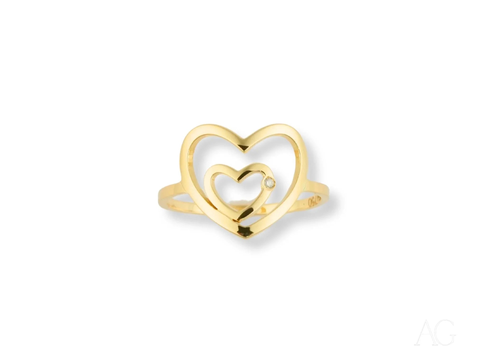 Gold heart ring with a smaller heart inside from the HHHH Collection in 18k yellow gold