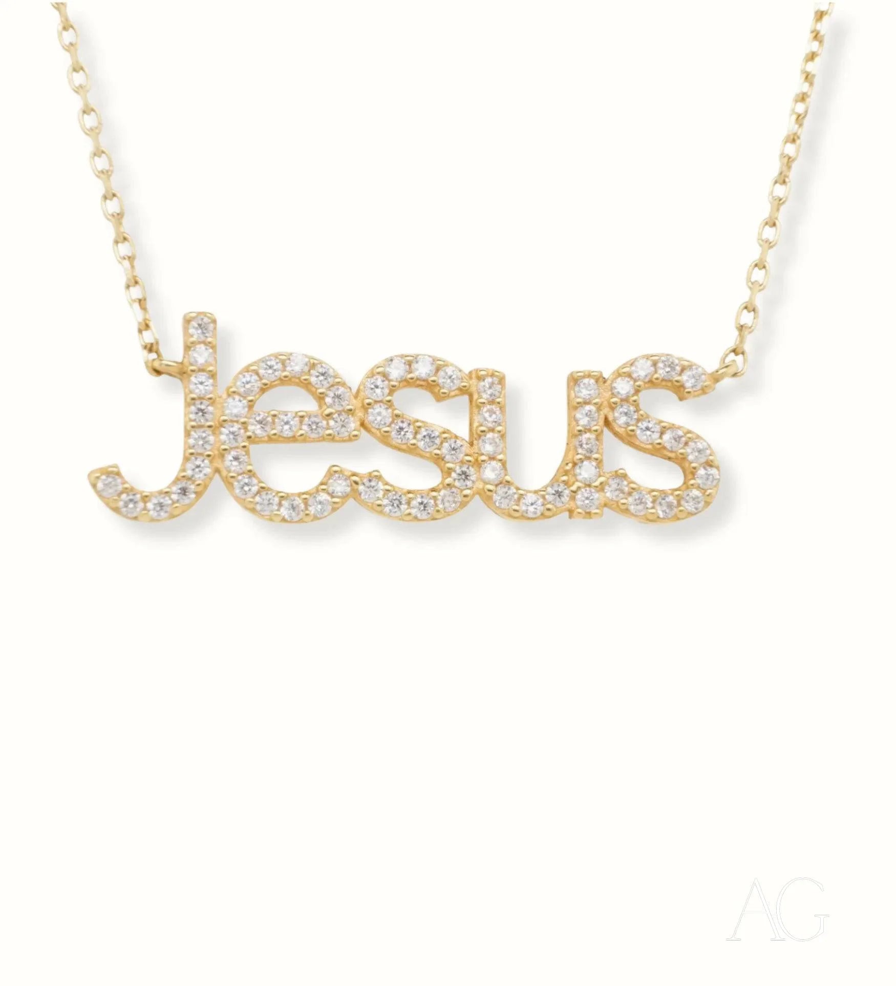 Gold necklace in 18k gold featuring diamond-encrusted Jesus letters by Art Gold