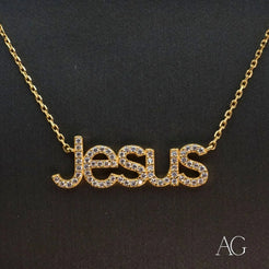 Gold necklace featuring diamond-adorned Jesus pendant in Art Gold craftsmanship