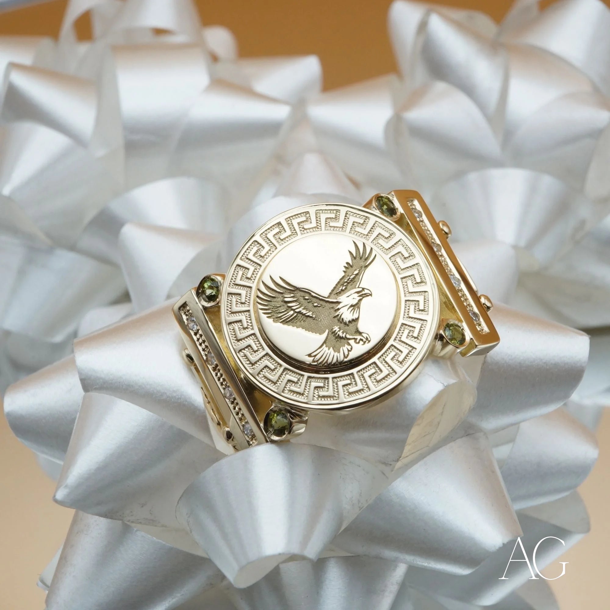 Gold-colored eagle ring with Greek key design from Limitless Custom Jewelry Designs