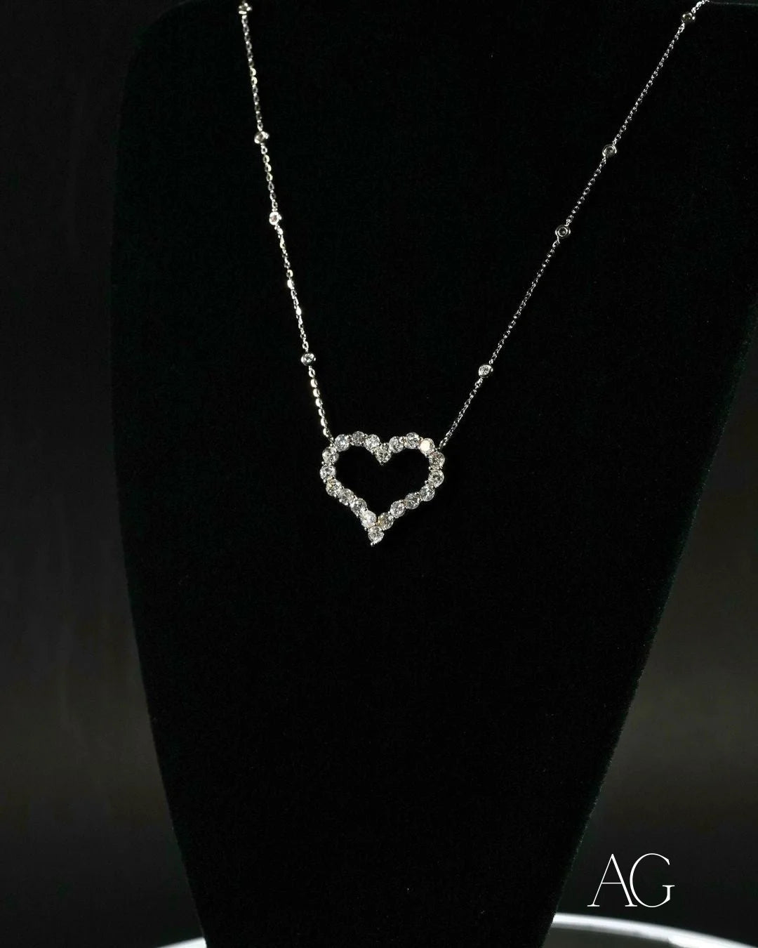 Heart-shaped diamond pendant on silver chain from Limitless Custom Jewelry Designs