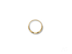 Elegant 18k yellow gold ring with decorative beads and cz heart design