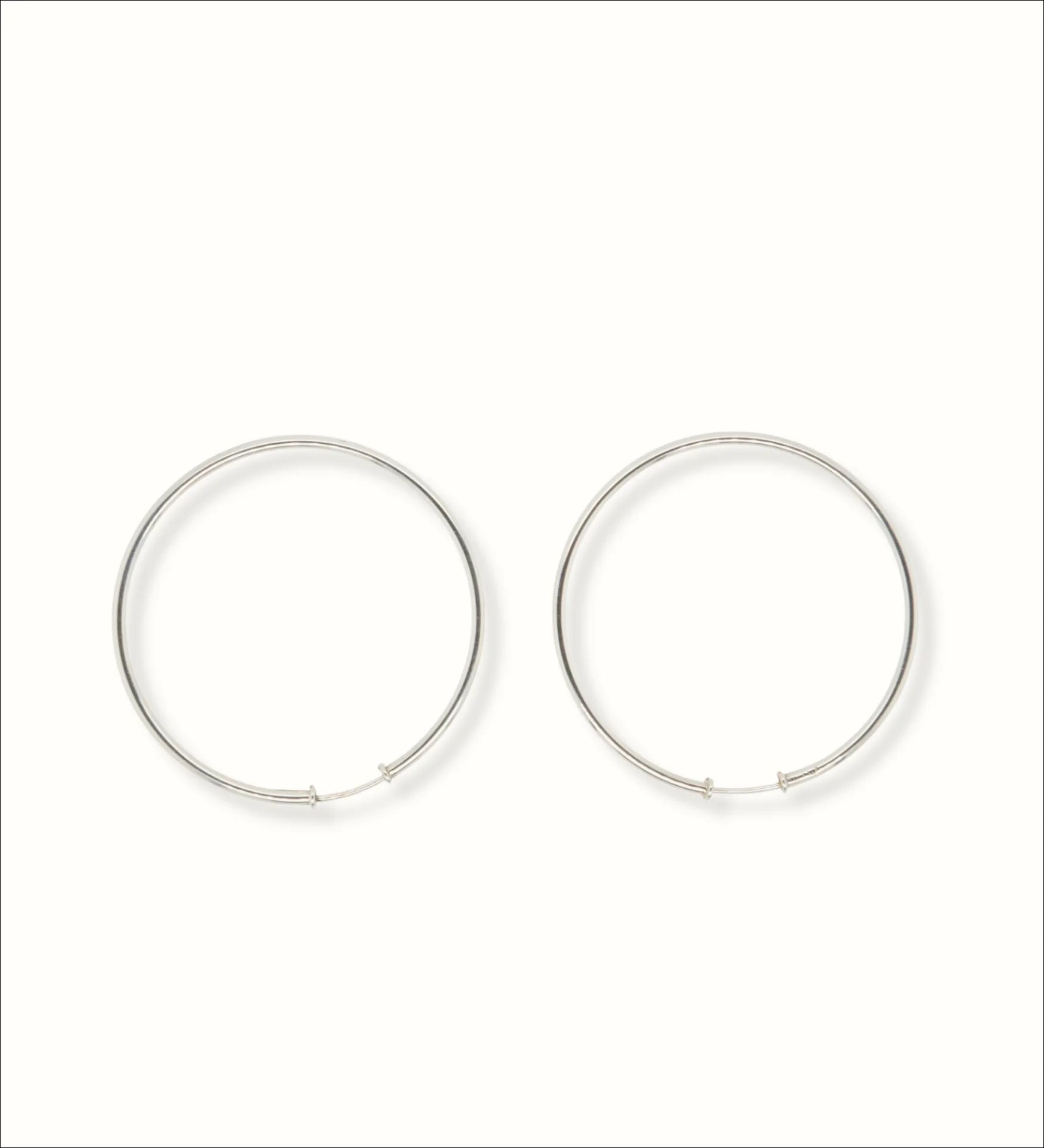 Luminescent Elegance: 18k White Gold Hoop Earrings | Home