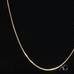 Luxurious 14k gold box chain necklace featuring an elegant AG pendant charm