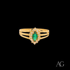 Luxurious 18k gold marquise green ring with an oval emerald and diamond accents