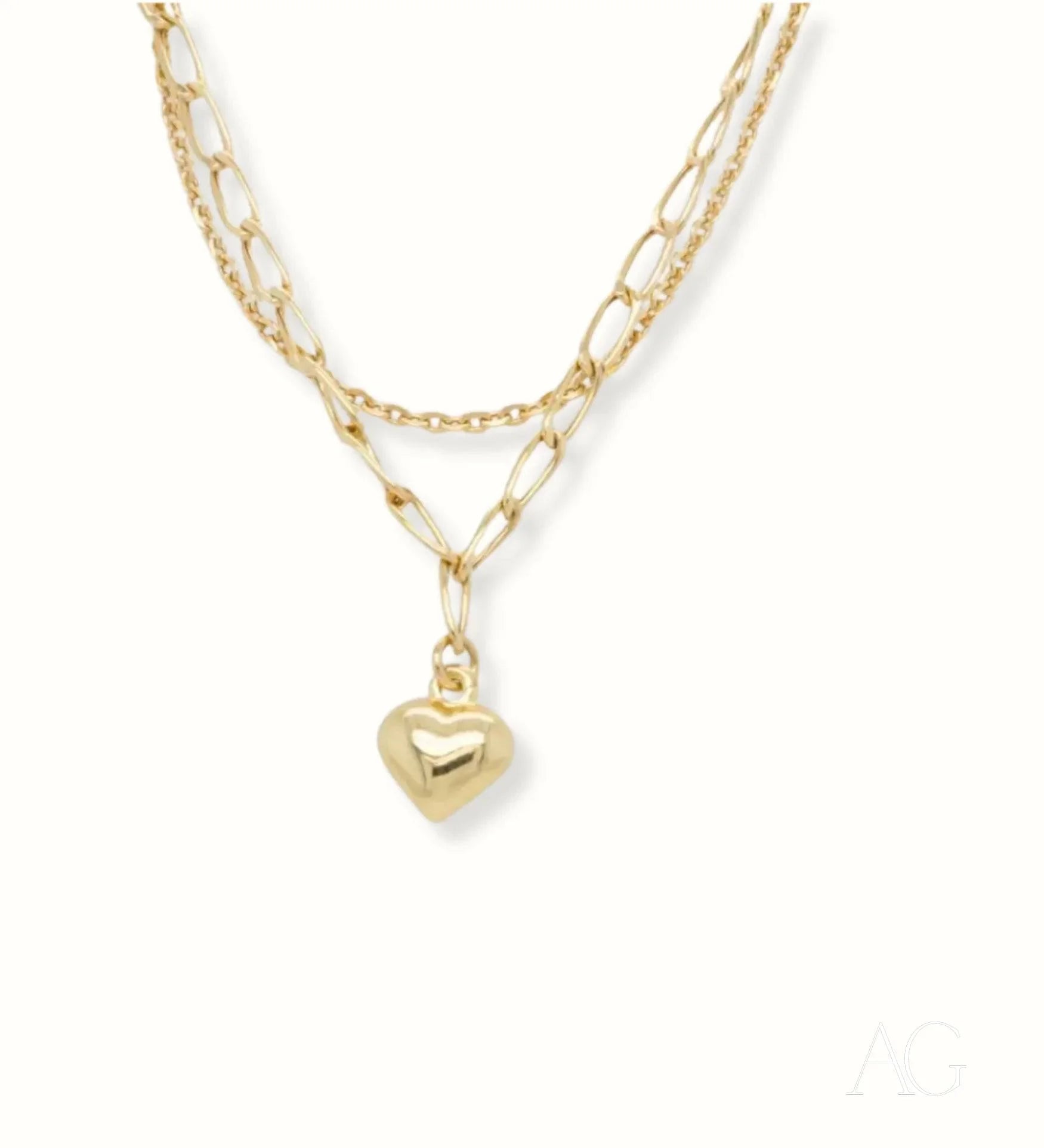 Gold-toned layered necklace with heart-shaped pendant in 18k double chain design