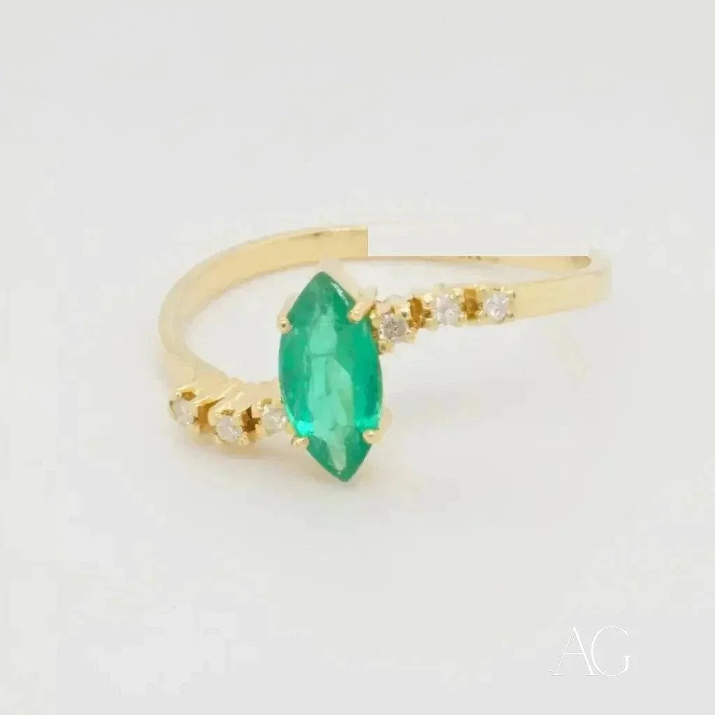 Gold Emerald Marquise Ring with Diamond Accents, luxurious jewelry design