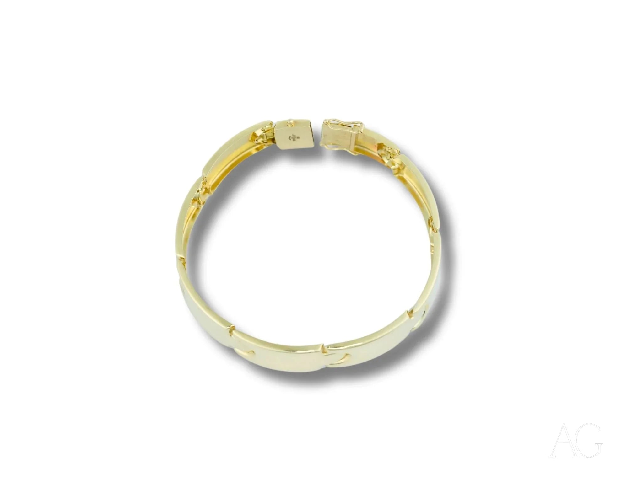 Gold and white bangle bracelet featuring an elegant open box clasp design