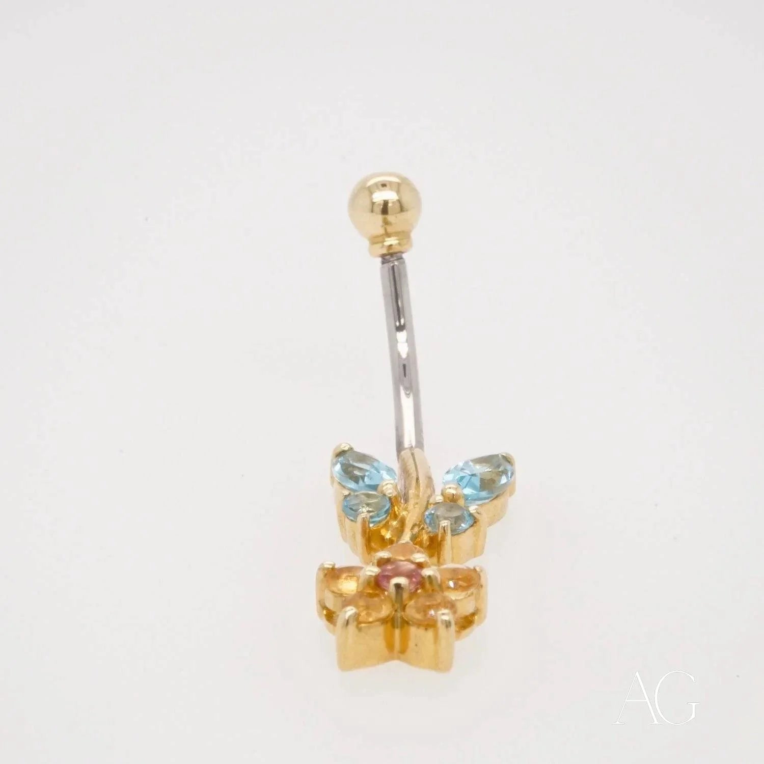 Luxury Topaz Bellybutton Piercing featuring an 18k gold flower design with colorful gems