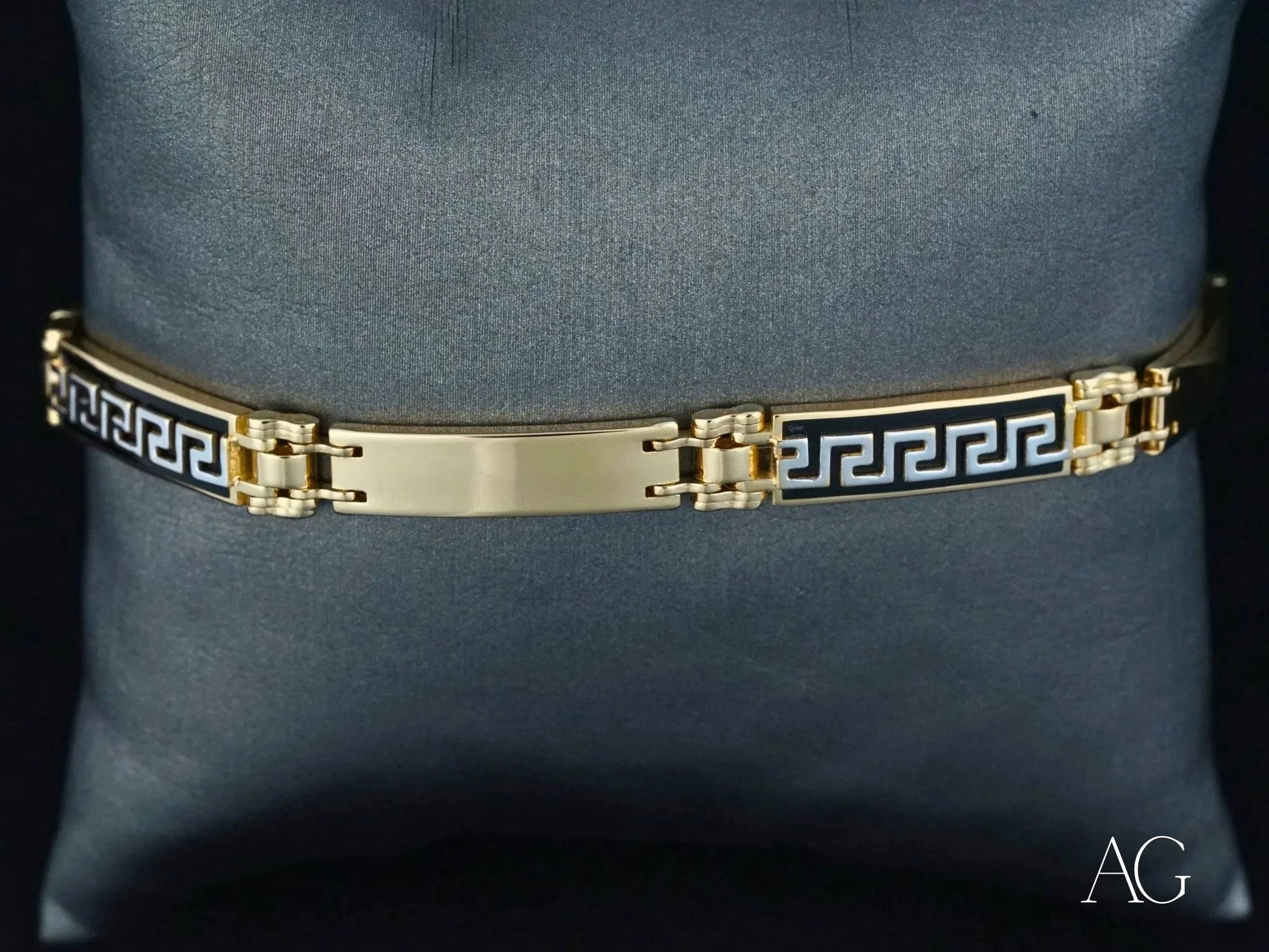 Gold-toned Men’s bracelet with 18k gold and white gold details, featuring Greek key pattern