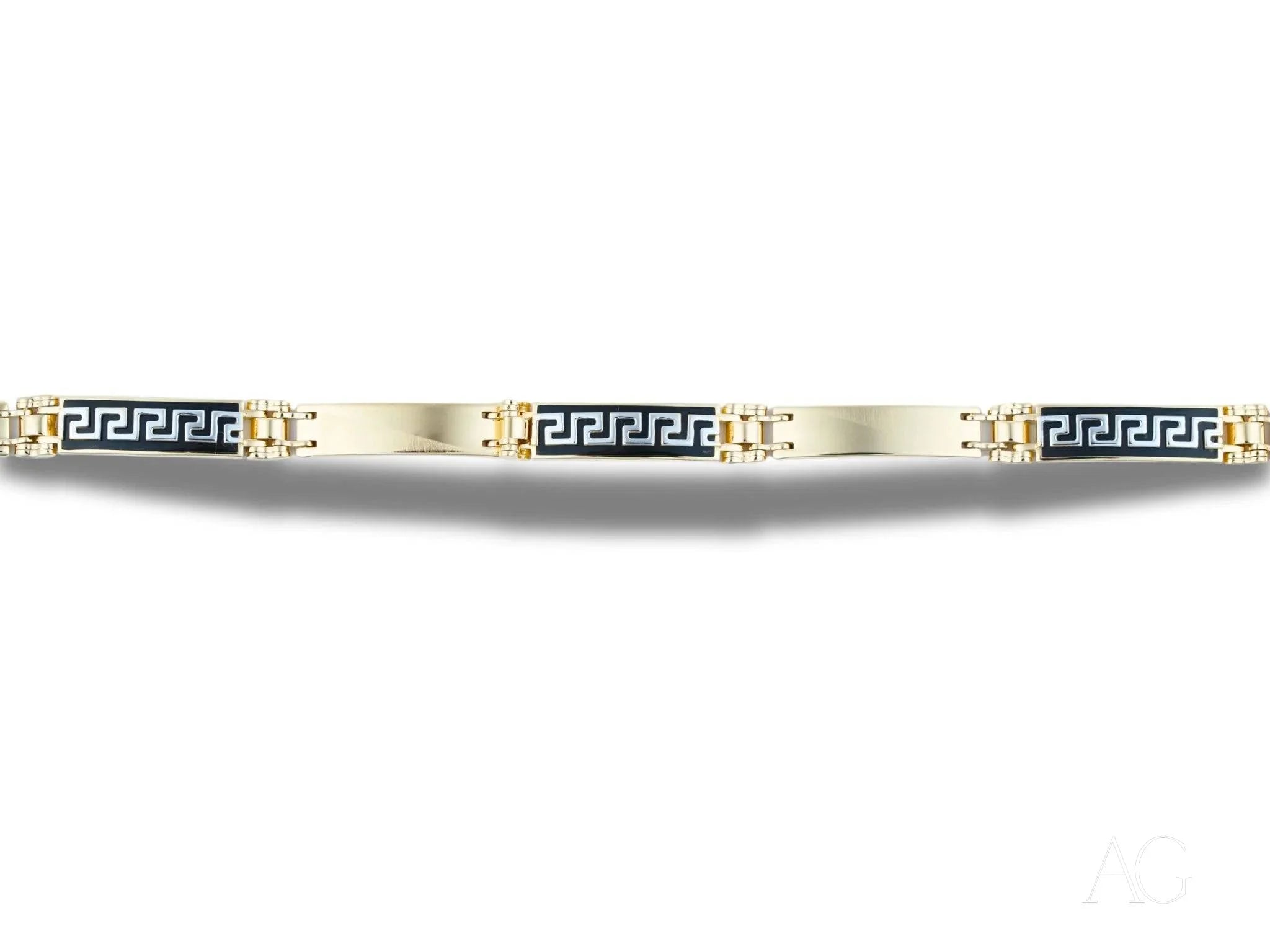 Gold and navy blue bracelet featuring Greek key links with 18k gold and white gold details