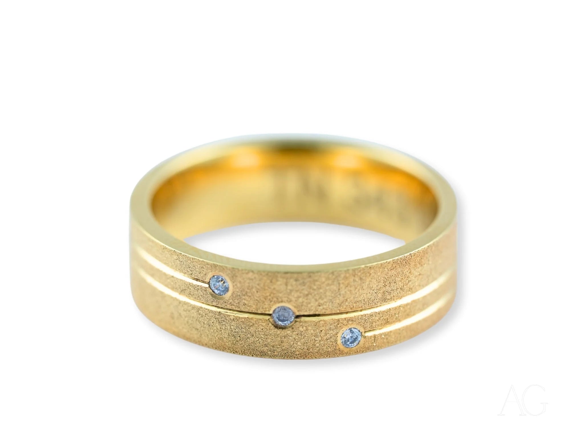 Gold Orbit Lines Wedding Band with three blue gemstones and diamond accents in 14k gold