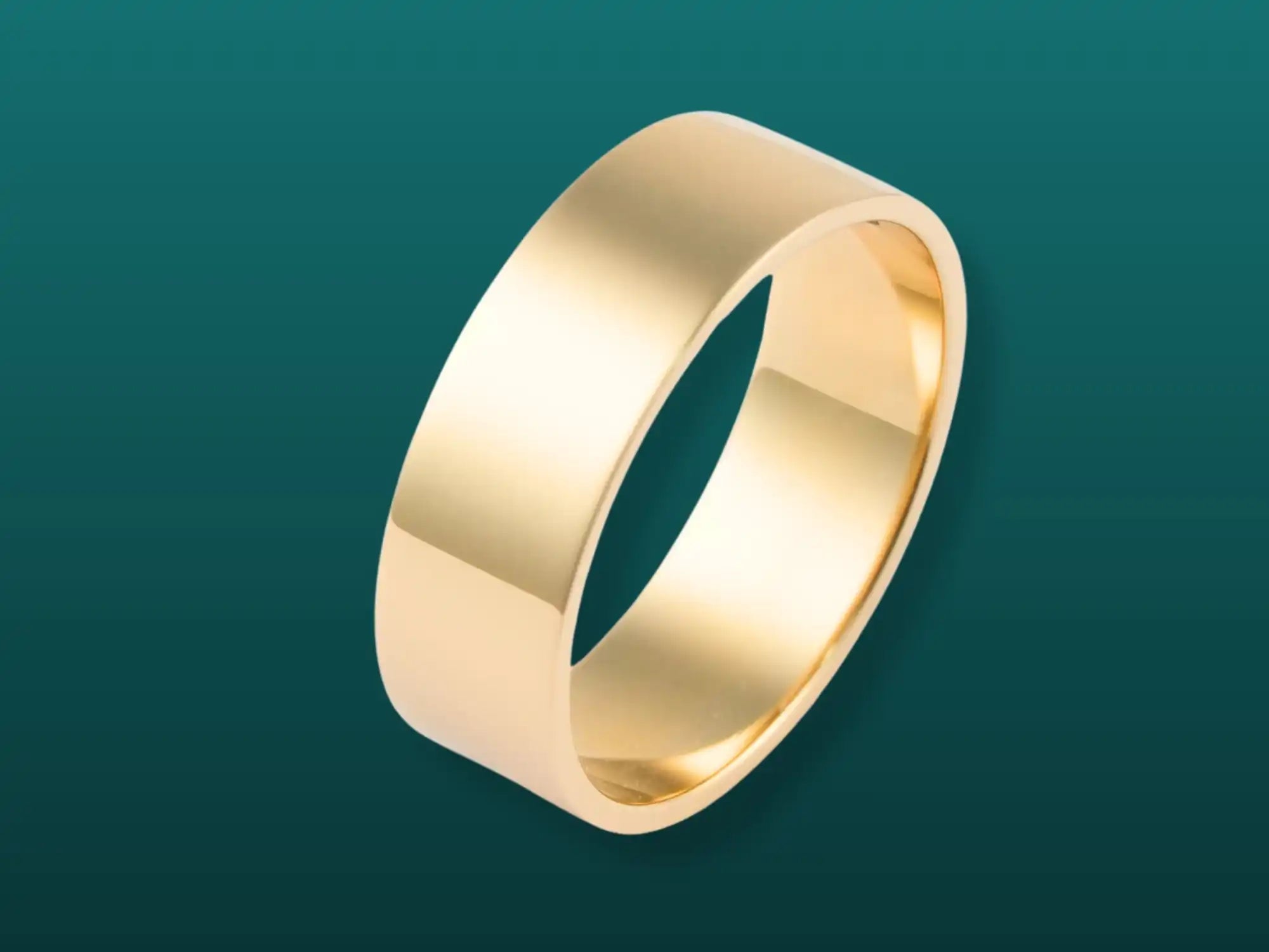 Plain gold wedding band with a matte finish.