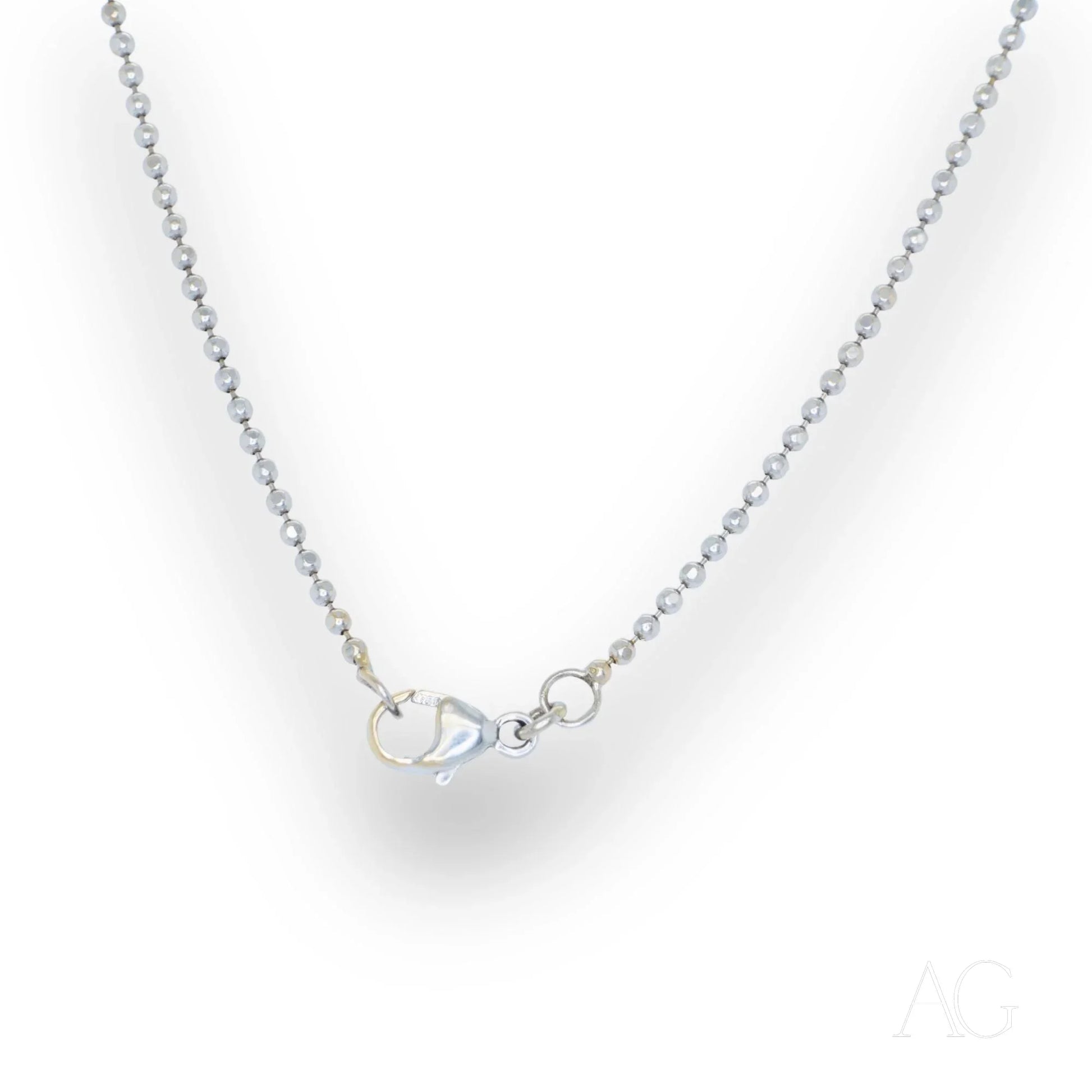 Delicate 18k white gold anklet featuring a silver chain and small clasp design