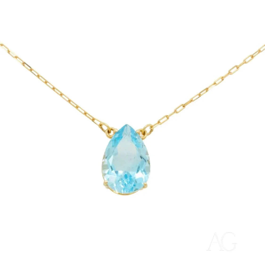 Teardrop light blue gemstone pendant on 18 carat gold necklace showcasing Blue Topaz