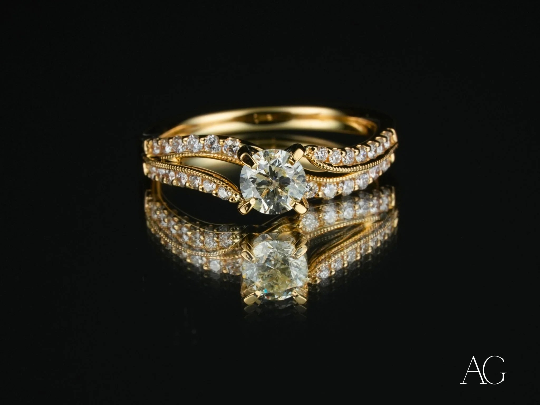 Gold Diamond Radiant Vow Engagement Ring featuring a center diamond and split shank design