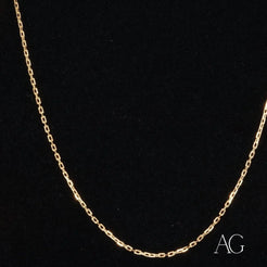 Radiant Diamond Cut 18k Gold Chain Necklace on Dark Background