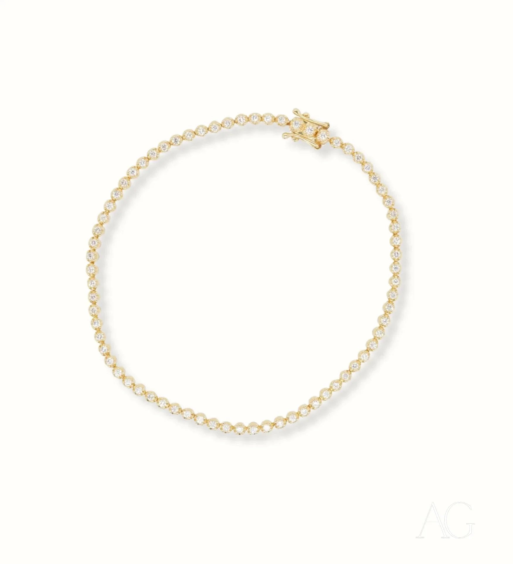 Delicate 18k gold bracelet with round beads and star clasp, perfect gold jewelry piece