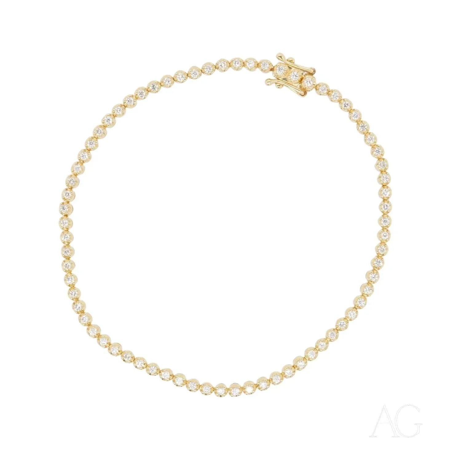 Delicate 18k gold bracelet with round beads and star-shaped clasp, perfect gold jewelry