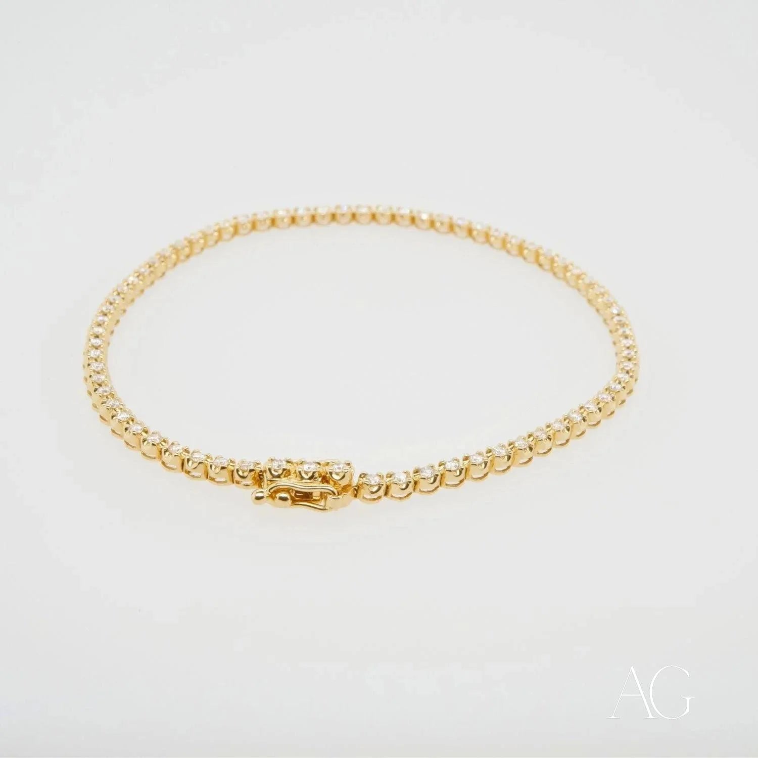 18k Gold Diamond Bracelet featuring a radiant gold tennis design with small diamonds