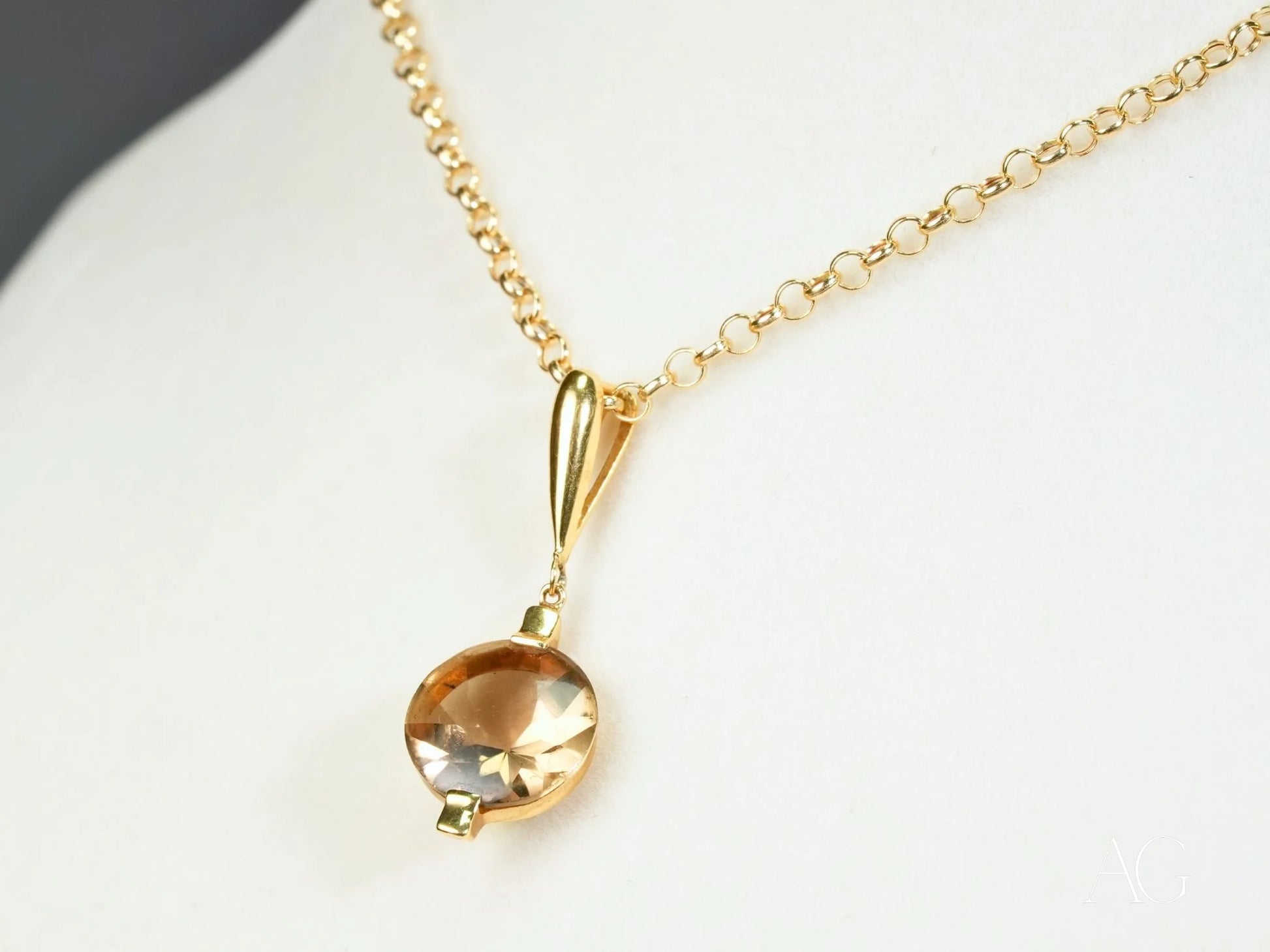 Gold-toned Smoked Crystal Luxe Pendant with champagne crystal drop and 18k gold details