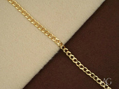 Solid 18k Gold Cuban Link Bracelet with interlocking links, bold and luxurious style