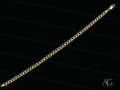 Solid 18k Gold Cuban Link Bracelet showcasing luxurious interlocking links design