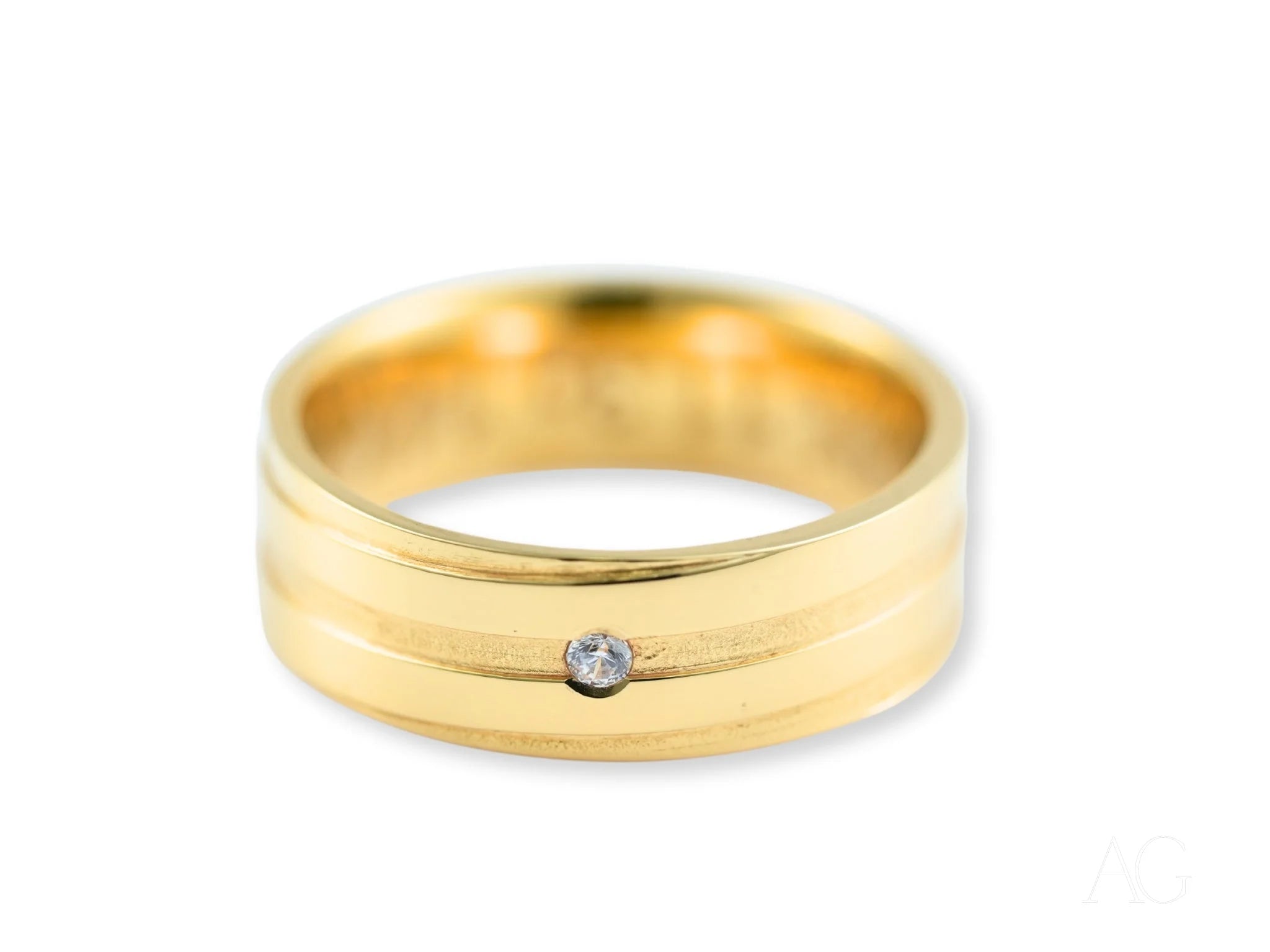 Gold wedding band with a small diamond from Solitaire Grace in 14k gold