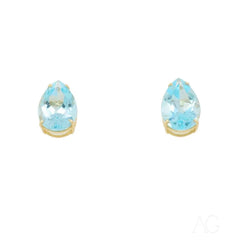 Teardrop-shaped blue topaz gold earrings with elegant gold settings