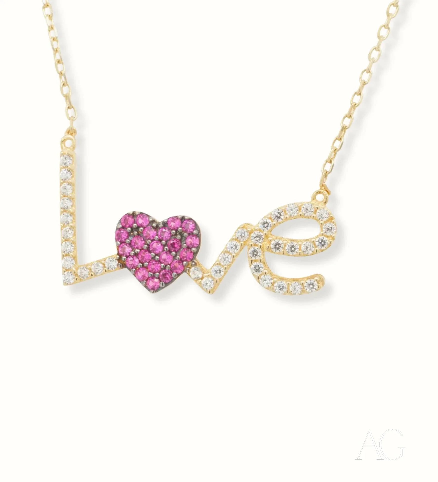 Gold jewelry Sparkling Love Necklace in 18k gold with pink gemstone heart design