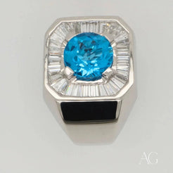 Ornate Swiss Blue Topaz Elegance Ring with round blue topaz, baguette diamonds, and black band