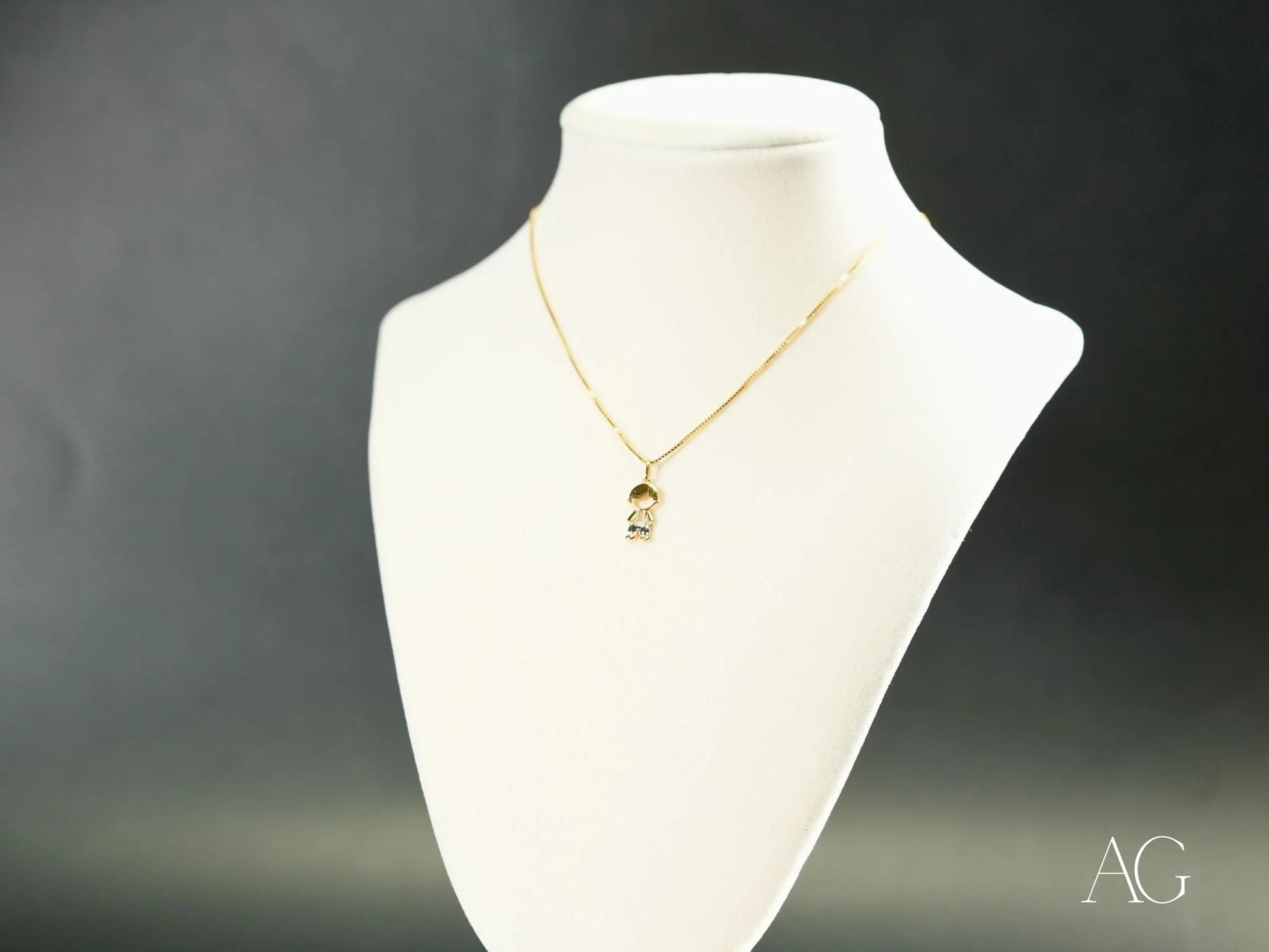 Gold necklace with Timeless Charm 18k Gold Boy or Girl Pendant on white bust