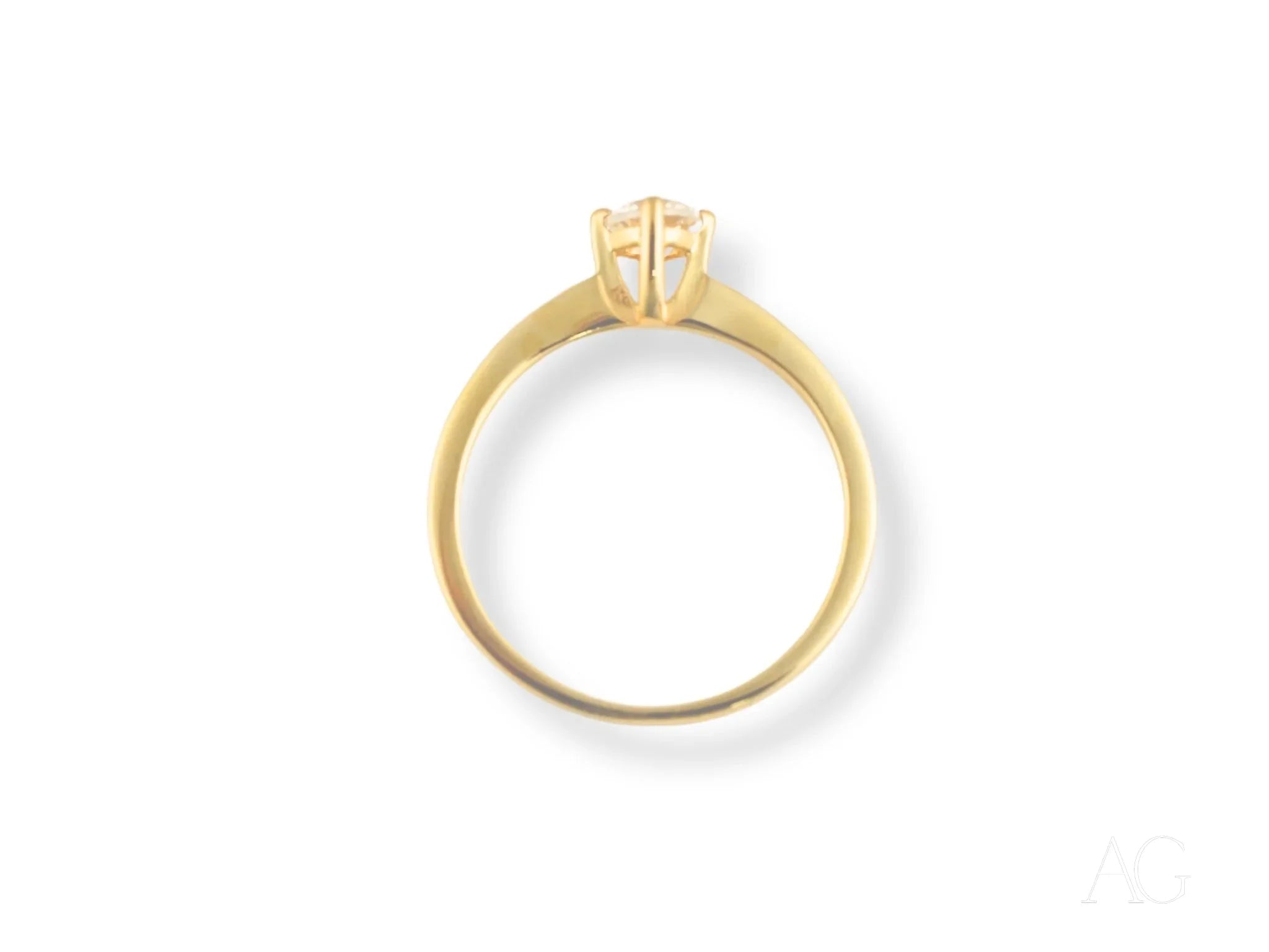 Gold engagement ring featuring a solitaire diamond in 18k yellow gold setting