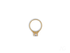 Gold ring with a diamond solitaire in 18k yellow gold for timeless elegance