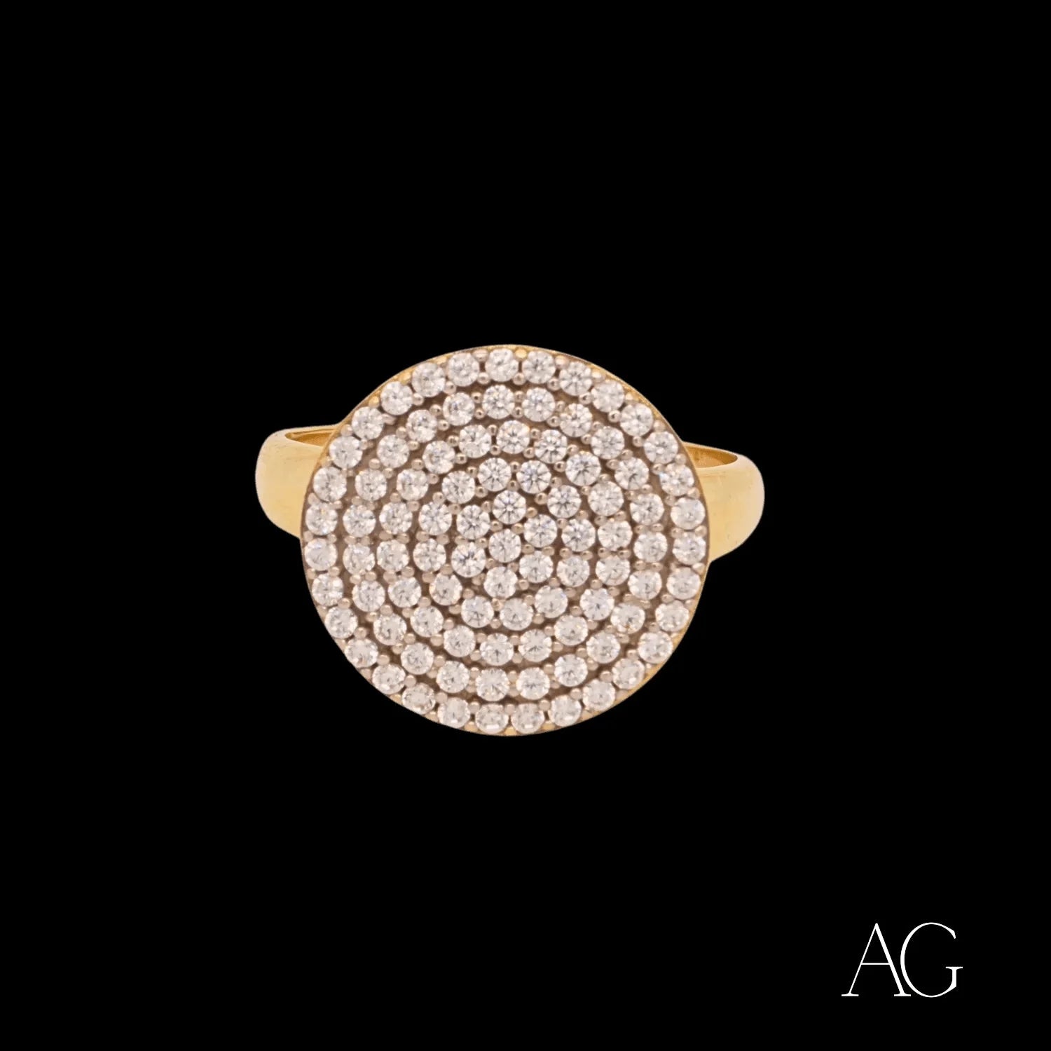 Circular diamond-encrusted 18k gold ring featuring a round cubic zirconia center