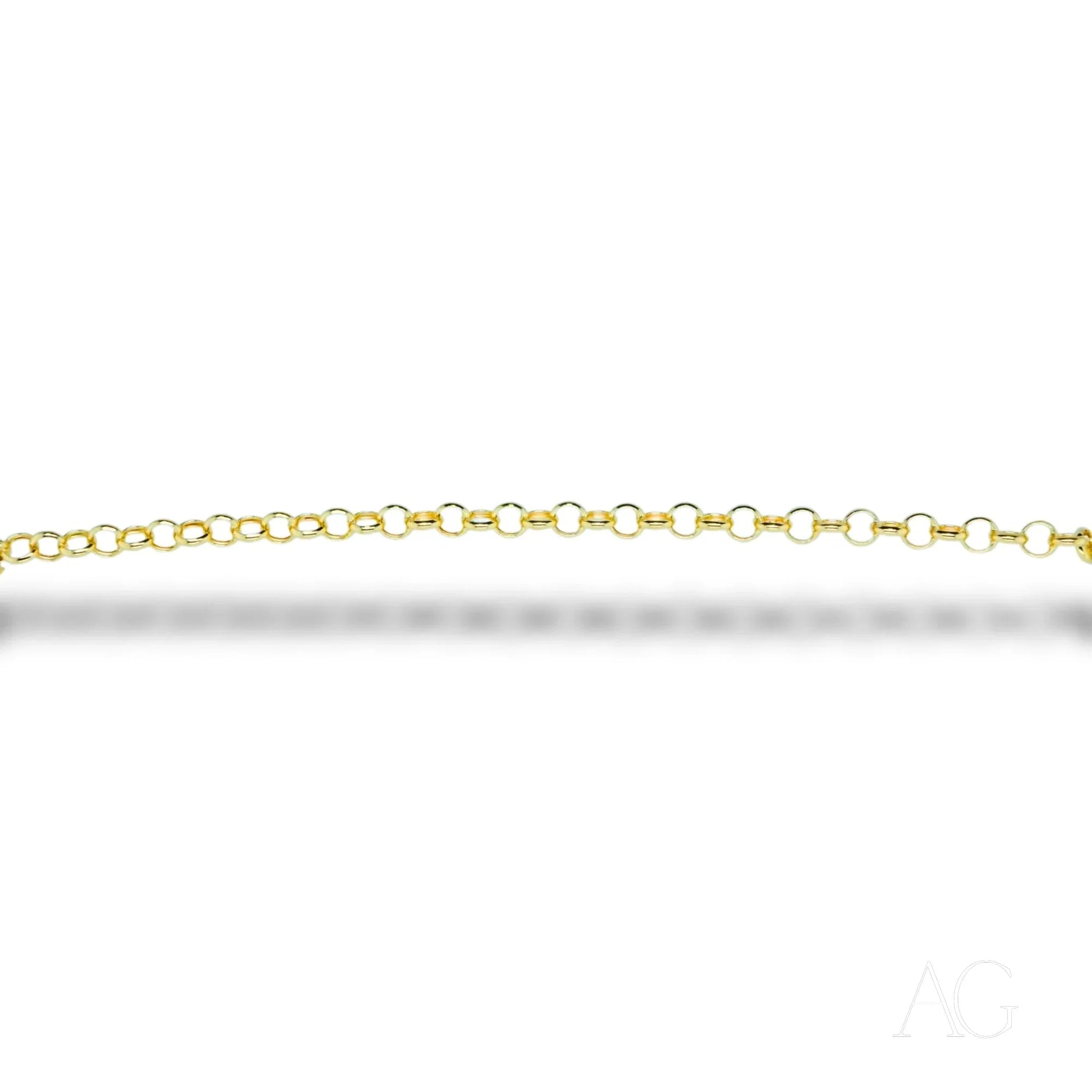 Gold chain necklace with small circular links showcased with Timeless 18k Gold Heart Bracelet