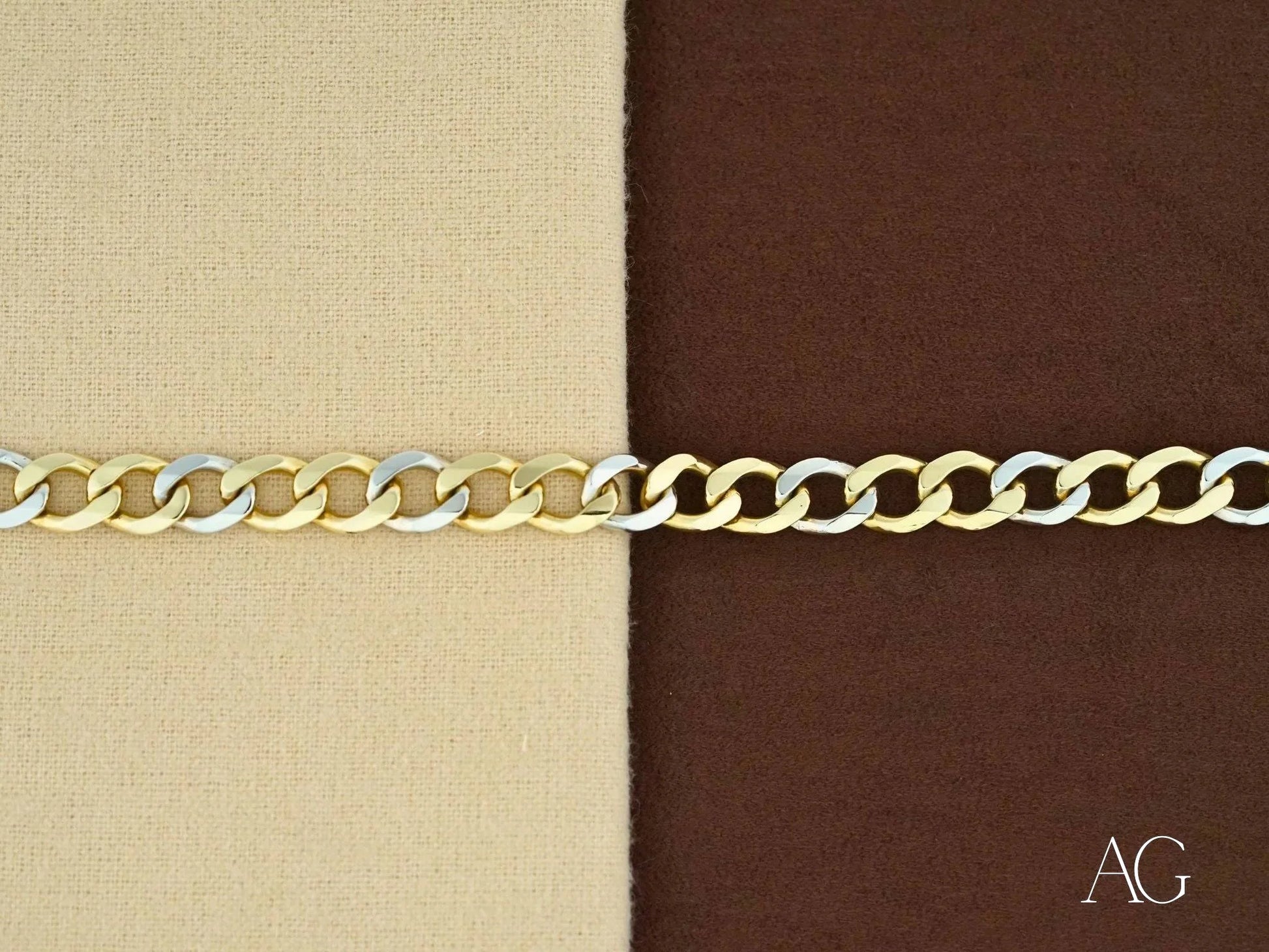 Gold flat cuban link bracelet in 18k white gold on a stylish two-toned background