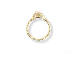 Gold engagement ring with center diamond and twisted rope-style band in 18k gold